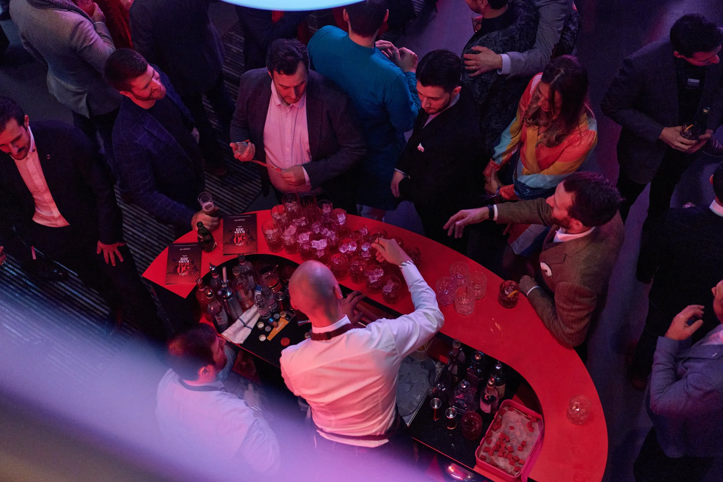 Aerial view of corporate cocktail bar crowd from above, London event photography