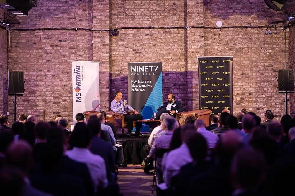 Delegates in the audience at a fintech conference, London conference photography