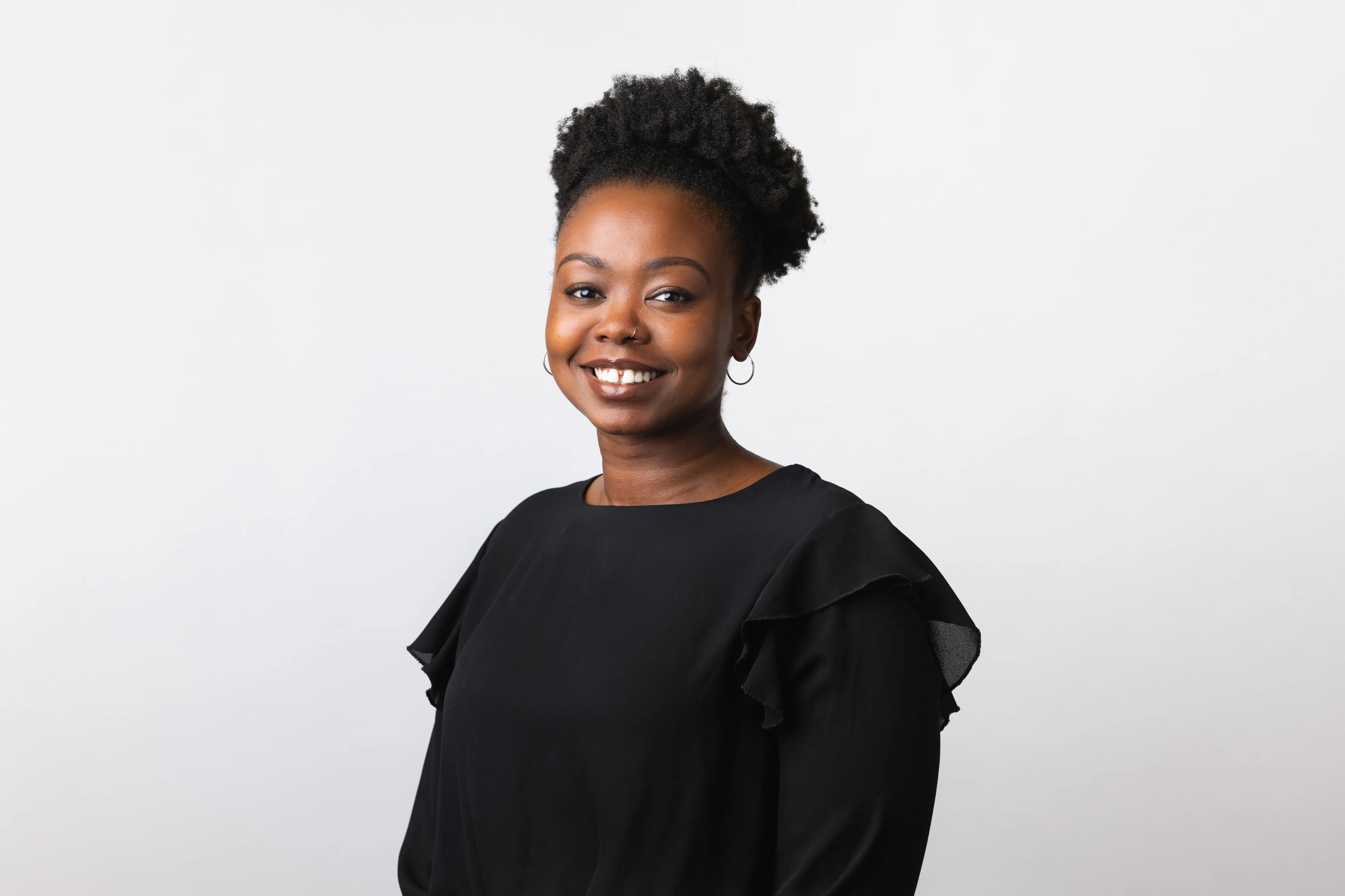 Professional studio headshot on clean white background, London