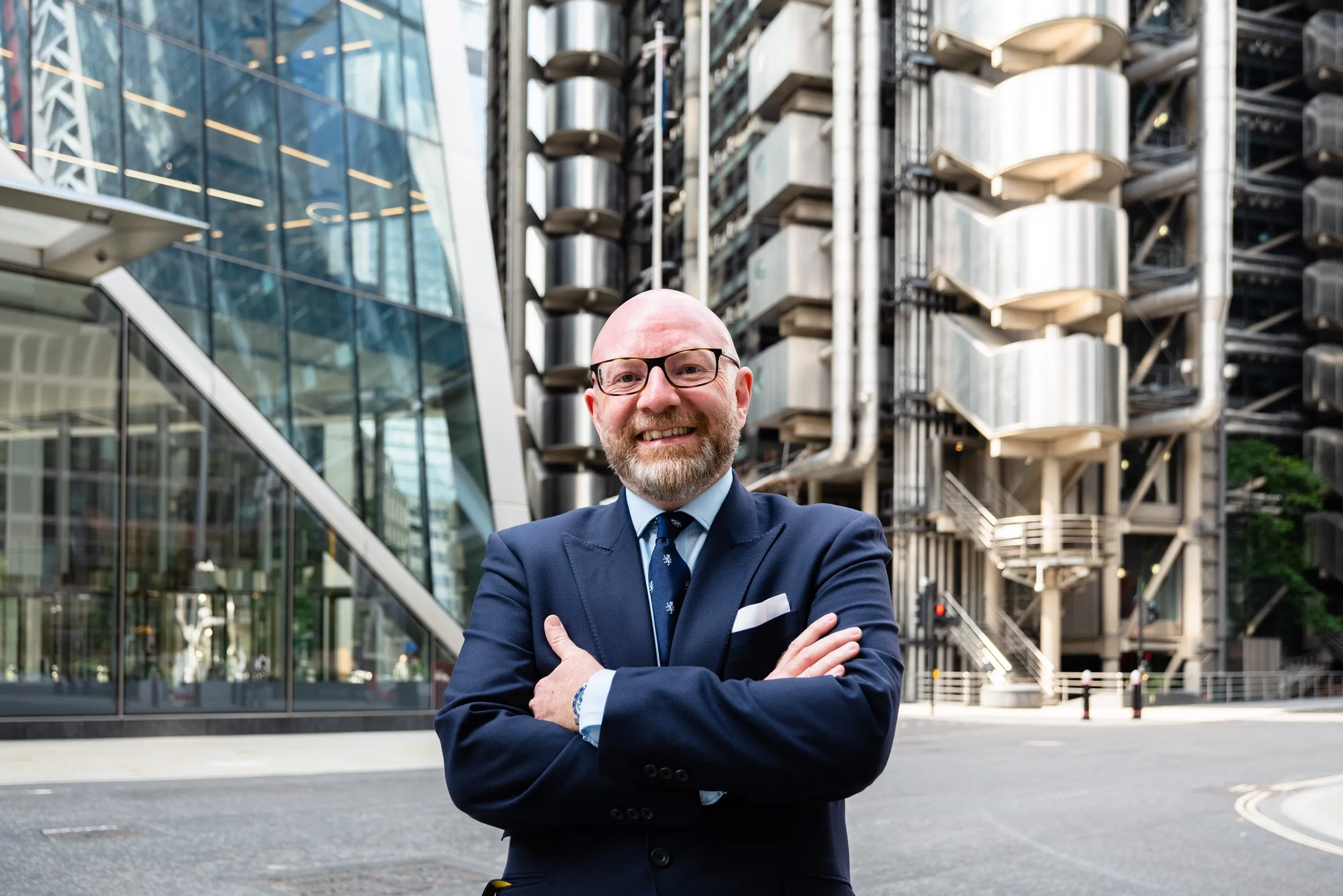 Insurance executive photographed at Lloyd's of London building, corporate lifestyle portrait, London